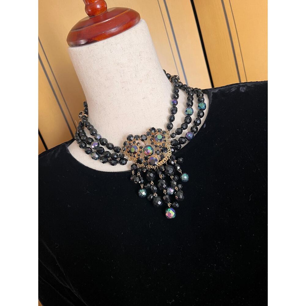 Multi strands beaded necklace in black and gold, gothic style